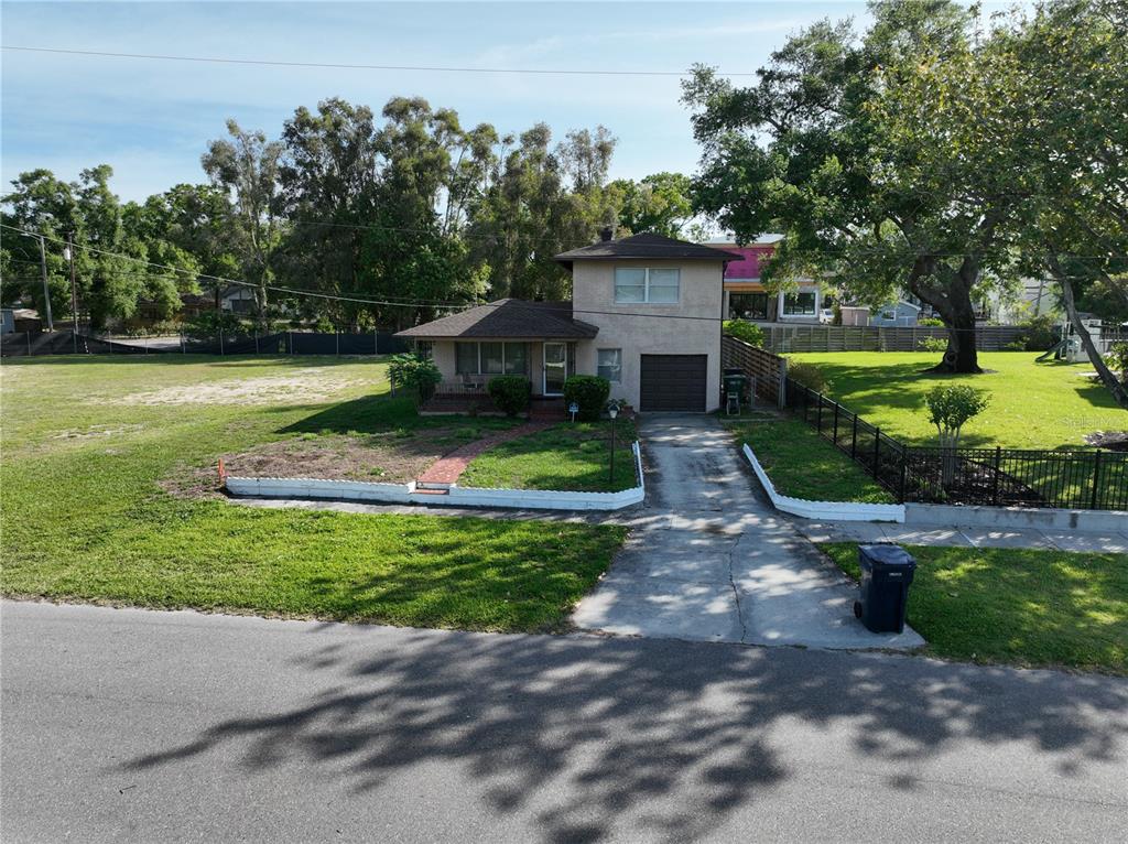 2515 North Riverside Drive Tampa, FL 33602 - Photo 12 of 19 a front view of a house with garden
