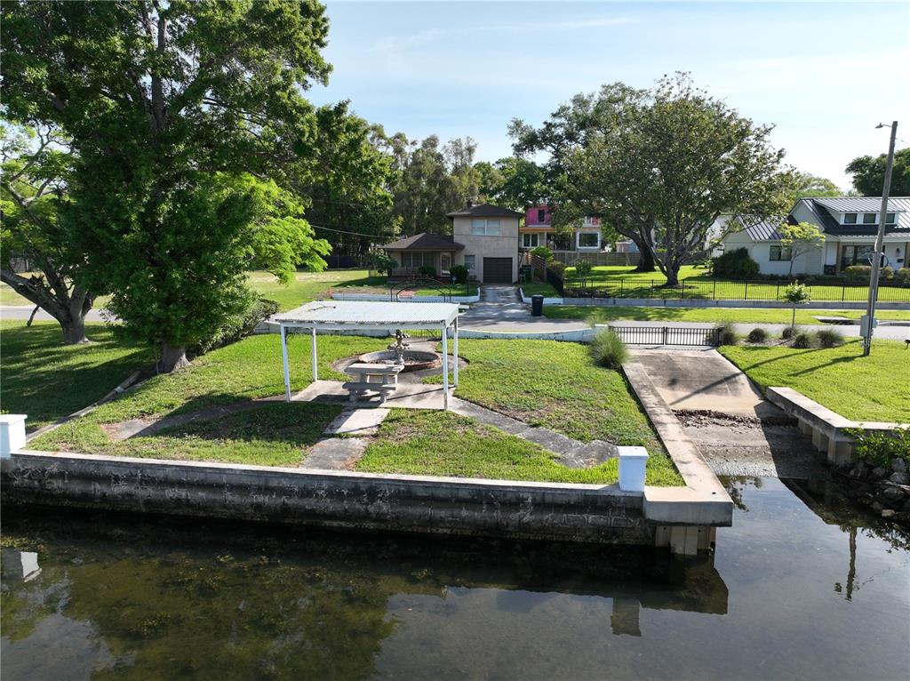 2515 North Riverside Drive Tampa, FL 33602 - Photo 14 of 19 a view of yard with swimming pool and outdoor seating