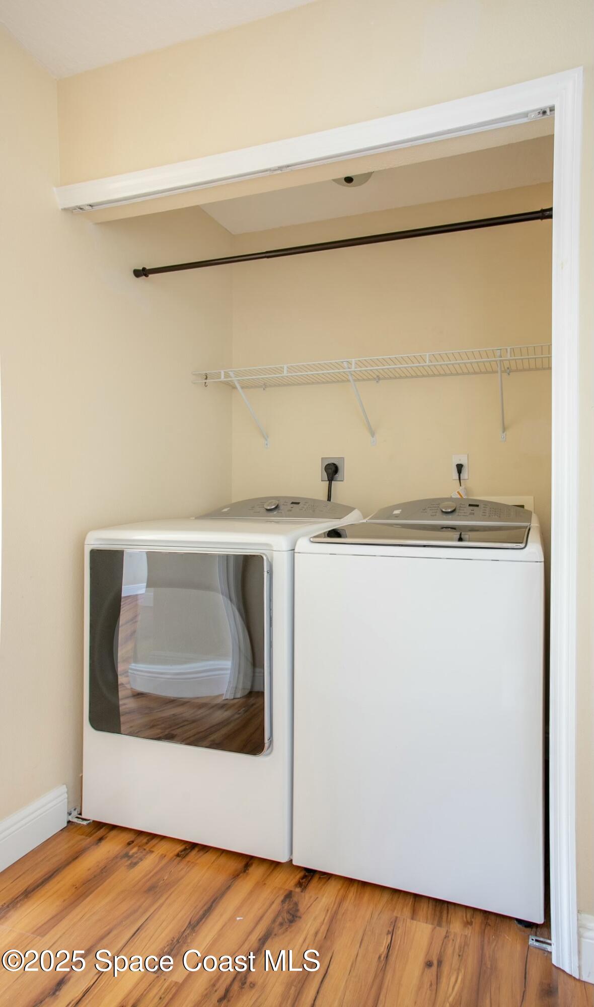6485 Orchid Avenue Cocoa, FL 32927 - Photo 13 of 24 a utility room with a sink washer and dryer