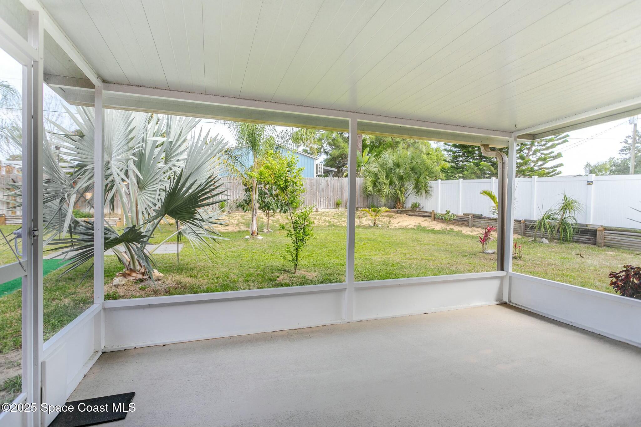6485 Orchid Avenue Cocoa, FL 32927 - Photo 21 of 24 a view of a porch with furniture and garden