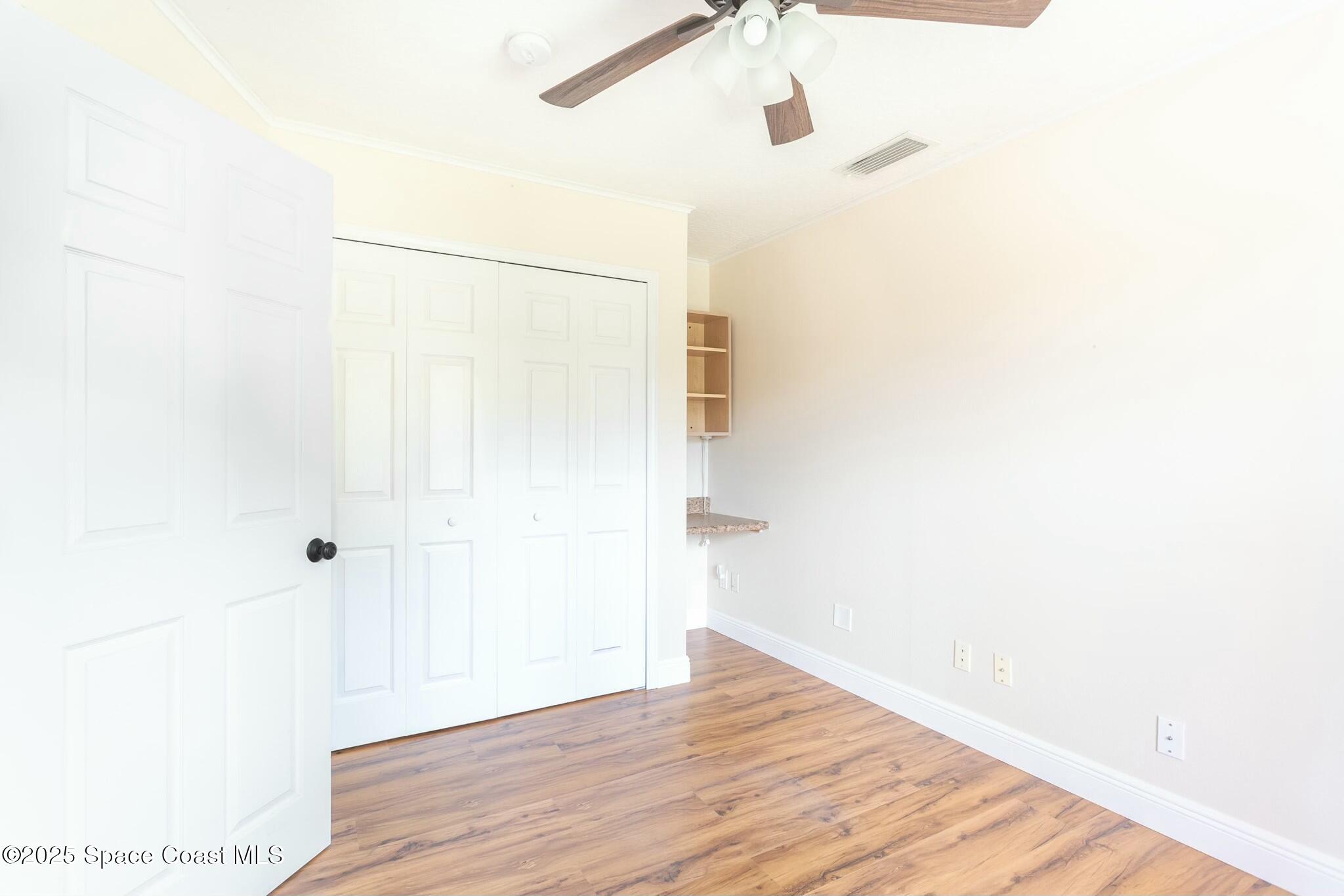 6485 Orchid Avenue Cocoa, FL 32927 - Photo 7 of 24 a view of a small space with wooden floor
