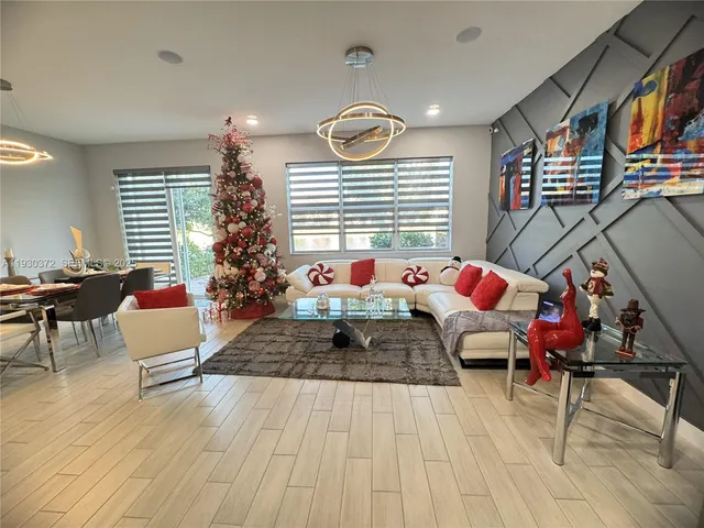 a kitchen with a table chairs and a stove