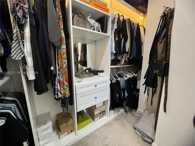 a view of a dinning table and chairs in the patio