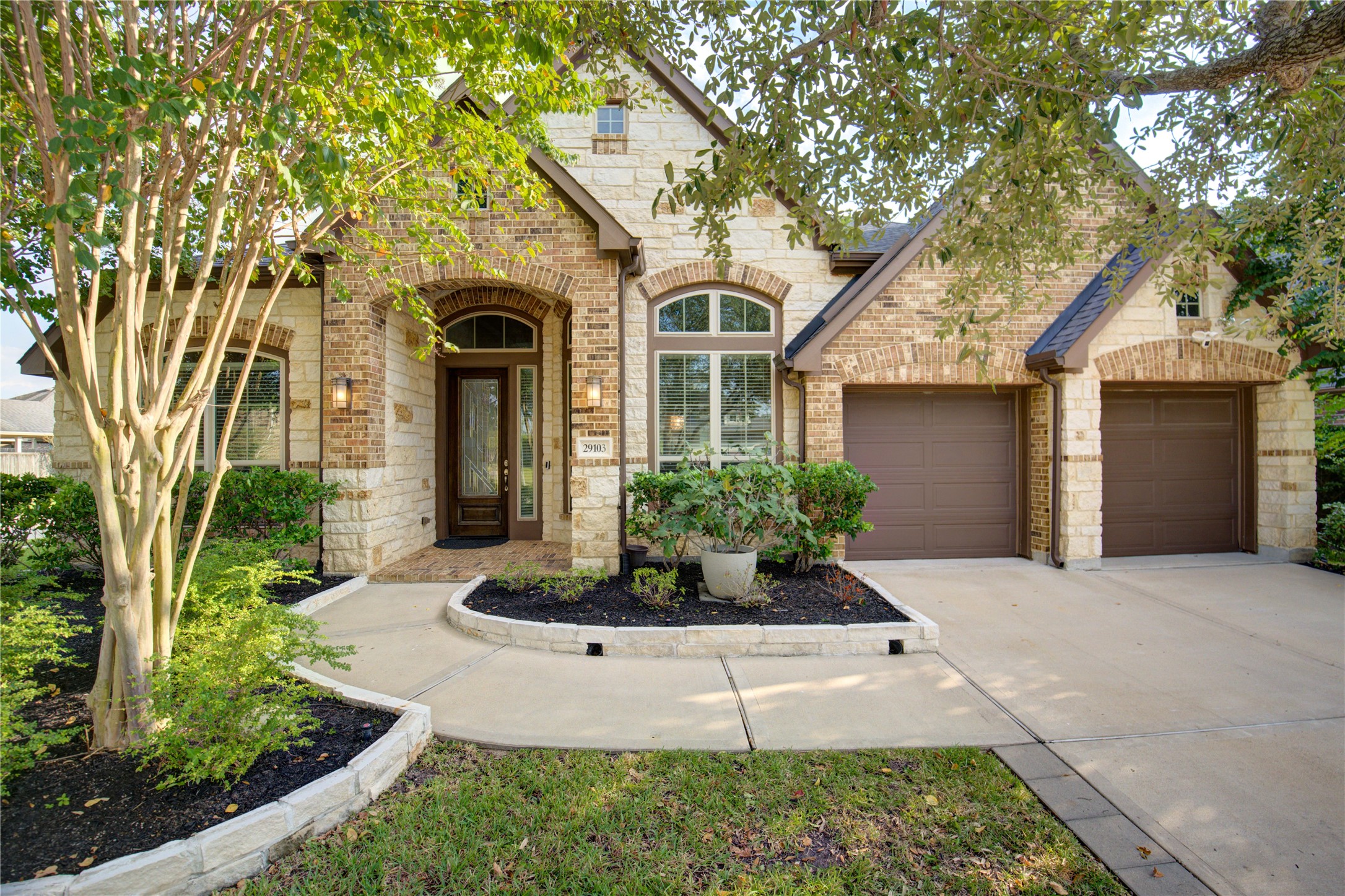 29103 Erica Lee Court Katy, TX 77494 - Photo 1 of 49 a front view of a house with a yard