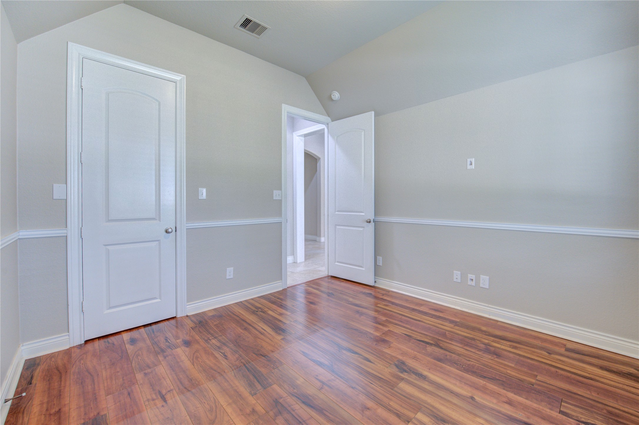 29103 Erica Lee Court Katy, TX 77494 - Photo 24 of 49 a view of an empty room with wooden floor
