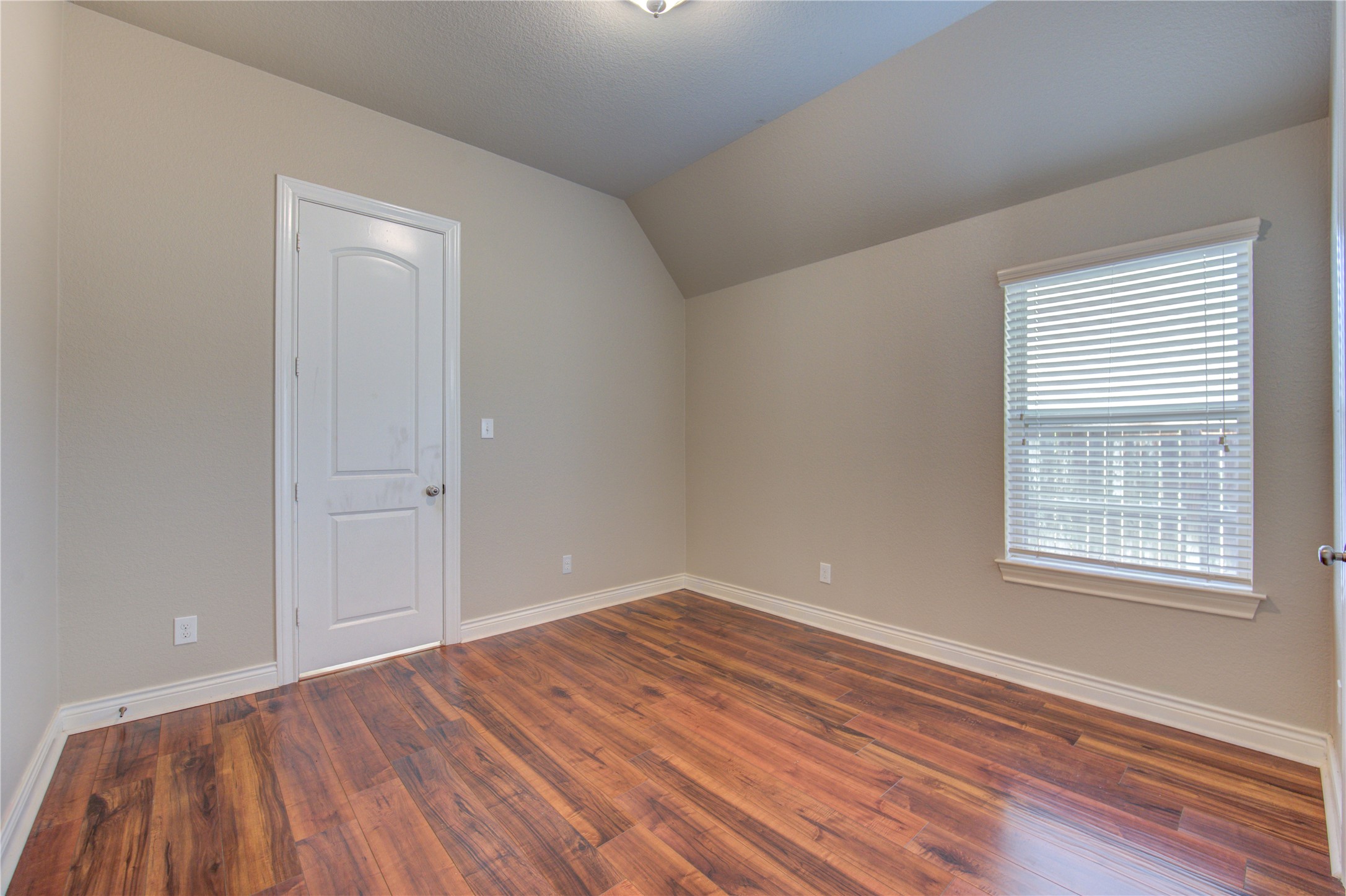 29103 Erica Lee Court Katy, TX 77494 - Photo 26 of 49 wooden floor in an empty room with a window