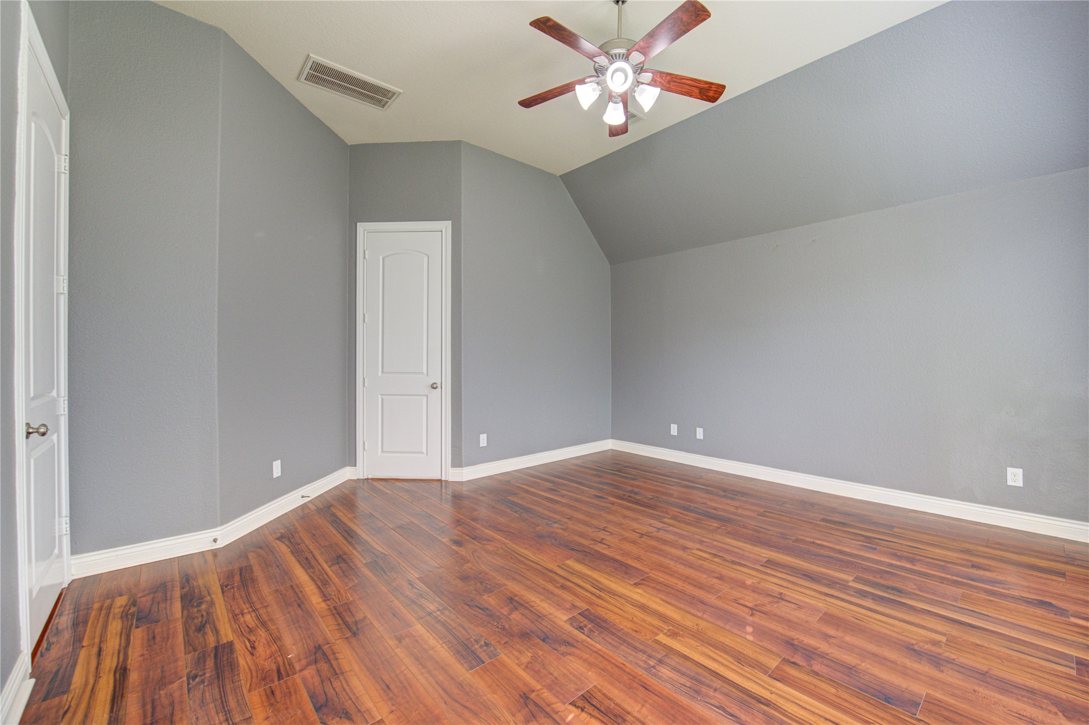 29103 Erica Lee Court Katy, TX 77494 - Photo 29 of 49 a view of empty room with wooden floor
