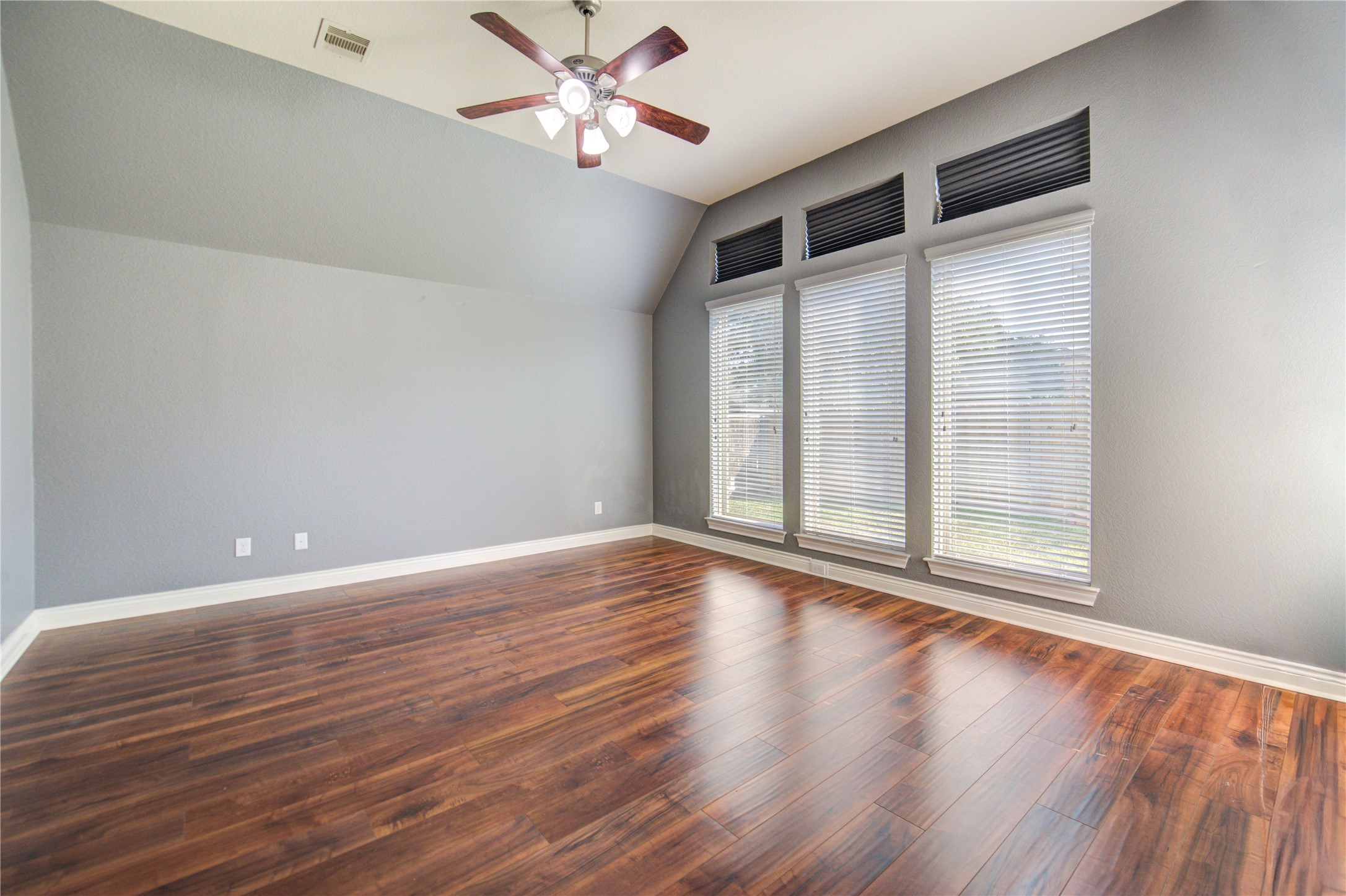29103 Erica Lee Court Katy, TX 77494 - Photo 30 of 49 a view of an empty room with wooden floor and a window