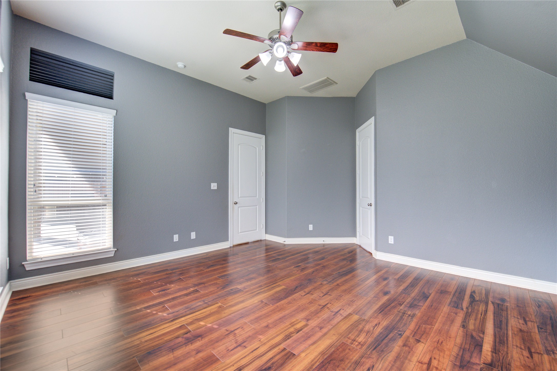 29103 Erica Lee Court Katy, TX 77494 - Photo 31 of 49 a view of an empty room with window and wooden floor