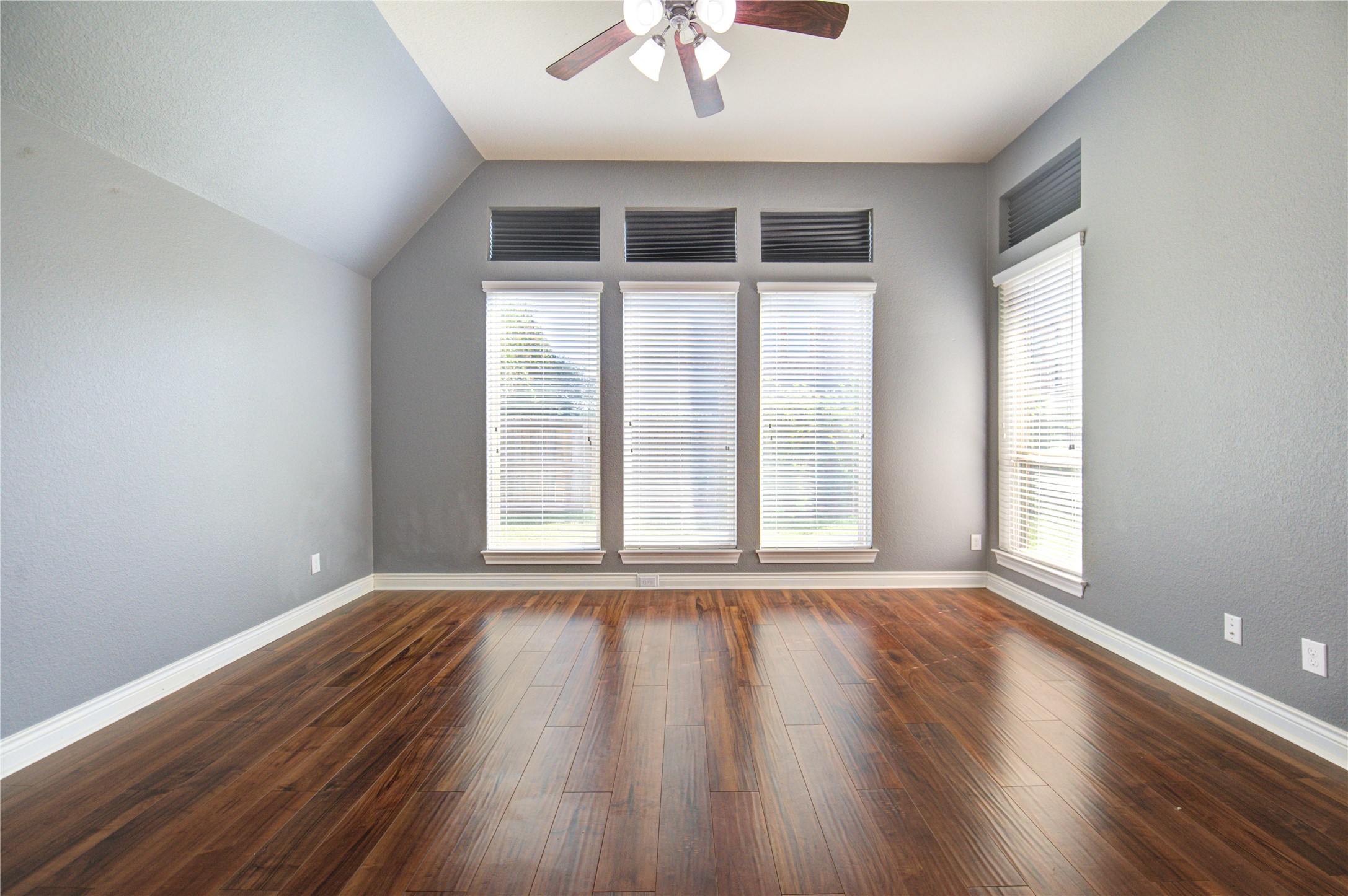29103 Erica Lee Court Katy, TX 77494 - Photo 32 of 49 a view of an empty room with wooden floor and a window