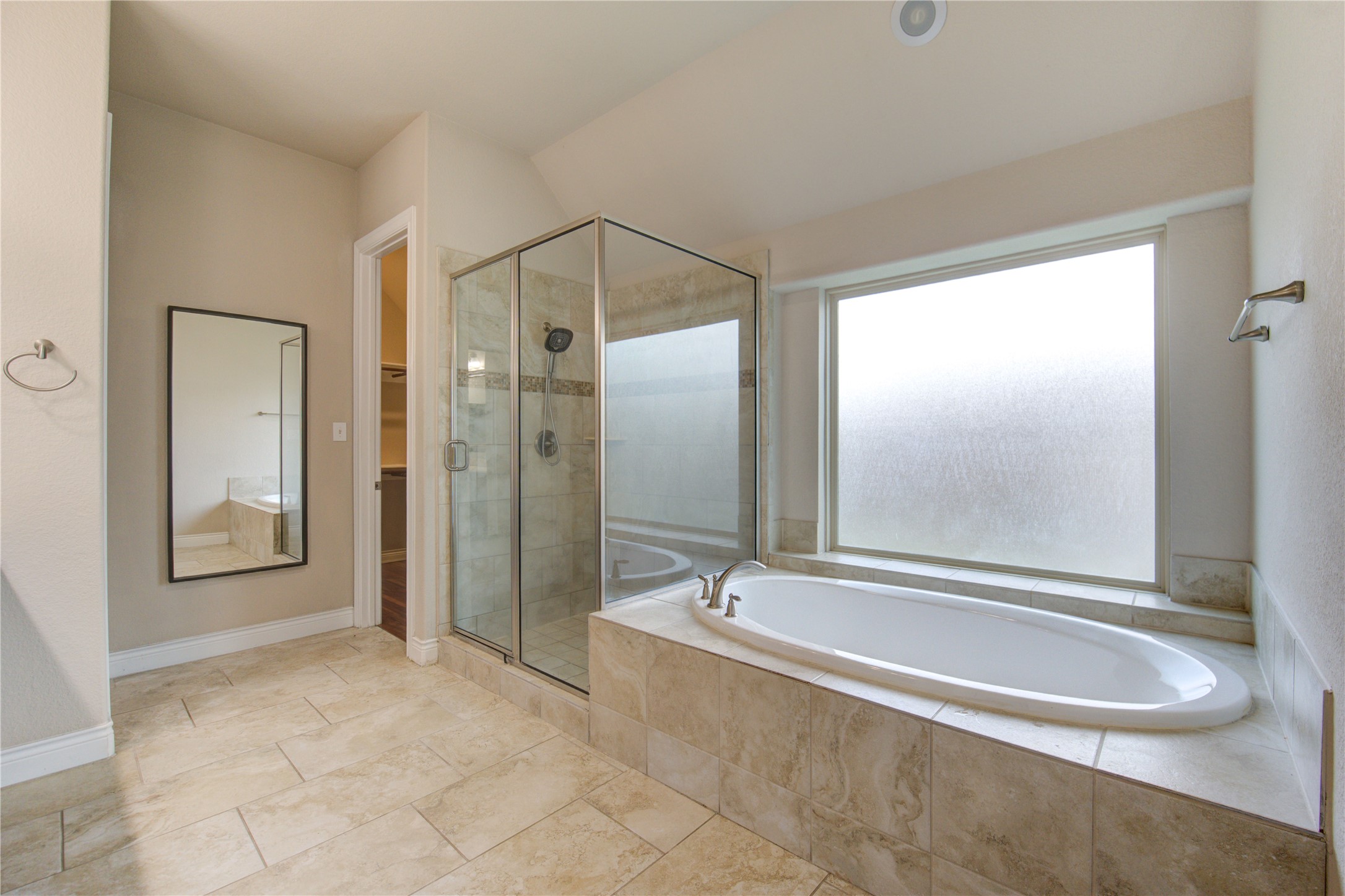 29103 Erica Lee Court Katy, TX 77494 - Photo 33 of 49 a bathroom with a bathtub and a shower