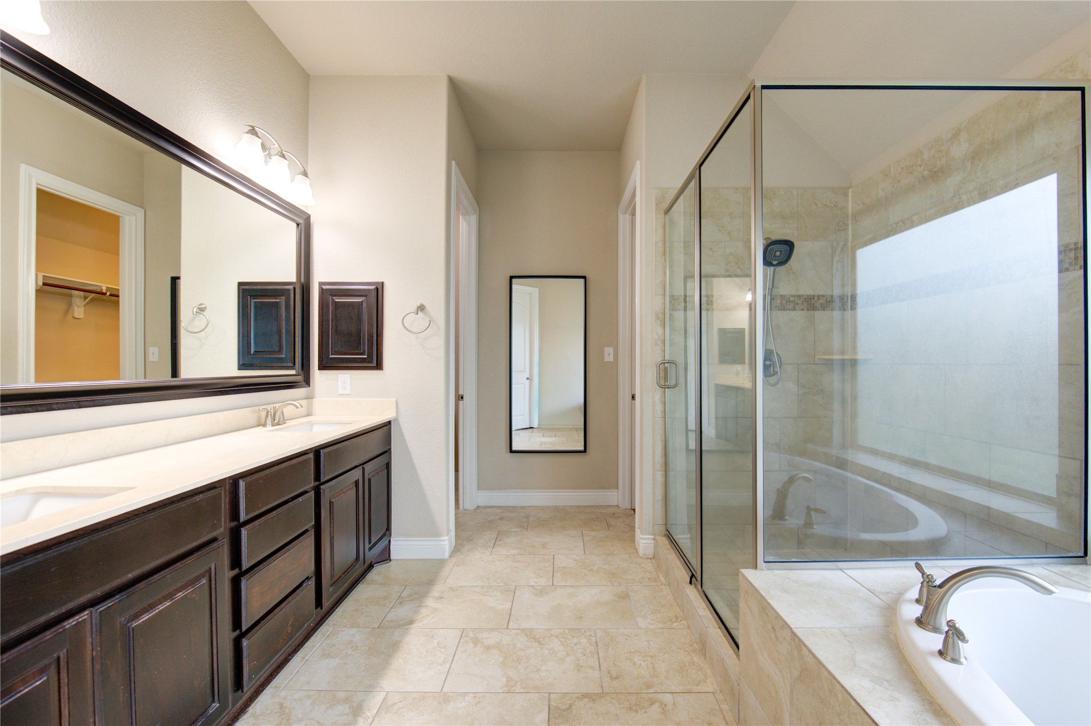 29103 Erica Lee Court Katy, TX 77494 - Photo 34 of 49 a bathroom with a granite countertop sink mirror and shower