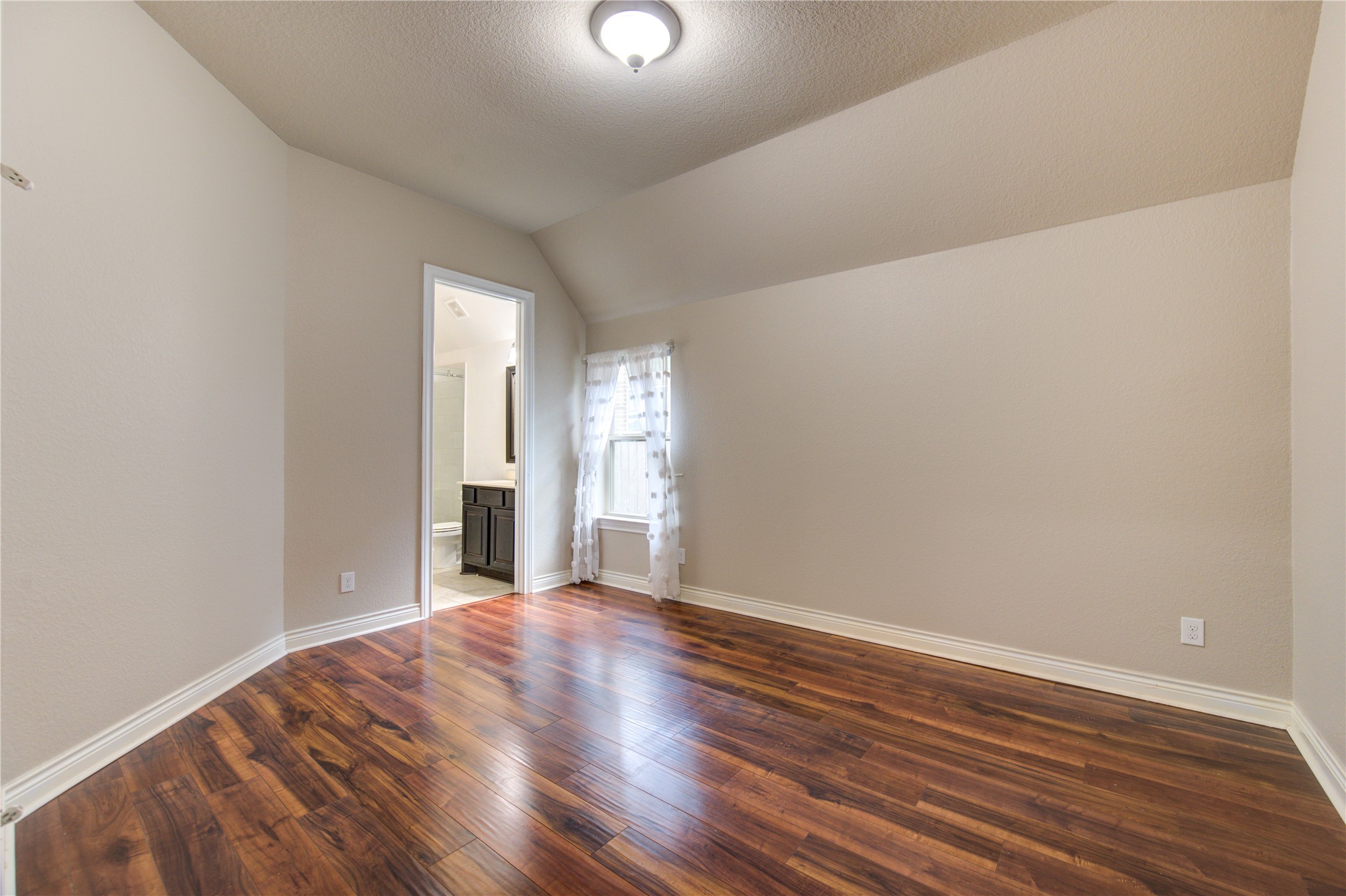 29103 Erica Lee Court Katy, TX 77494 - Photo 39 of 49 a view of wooden floor and windows in a room