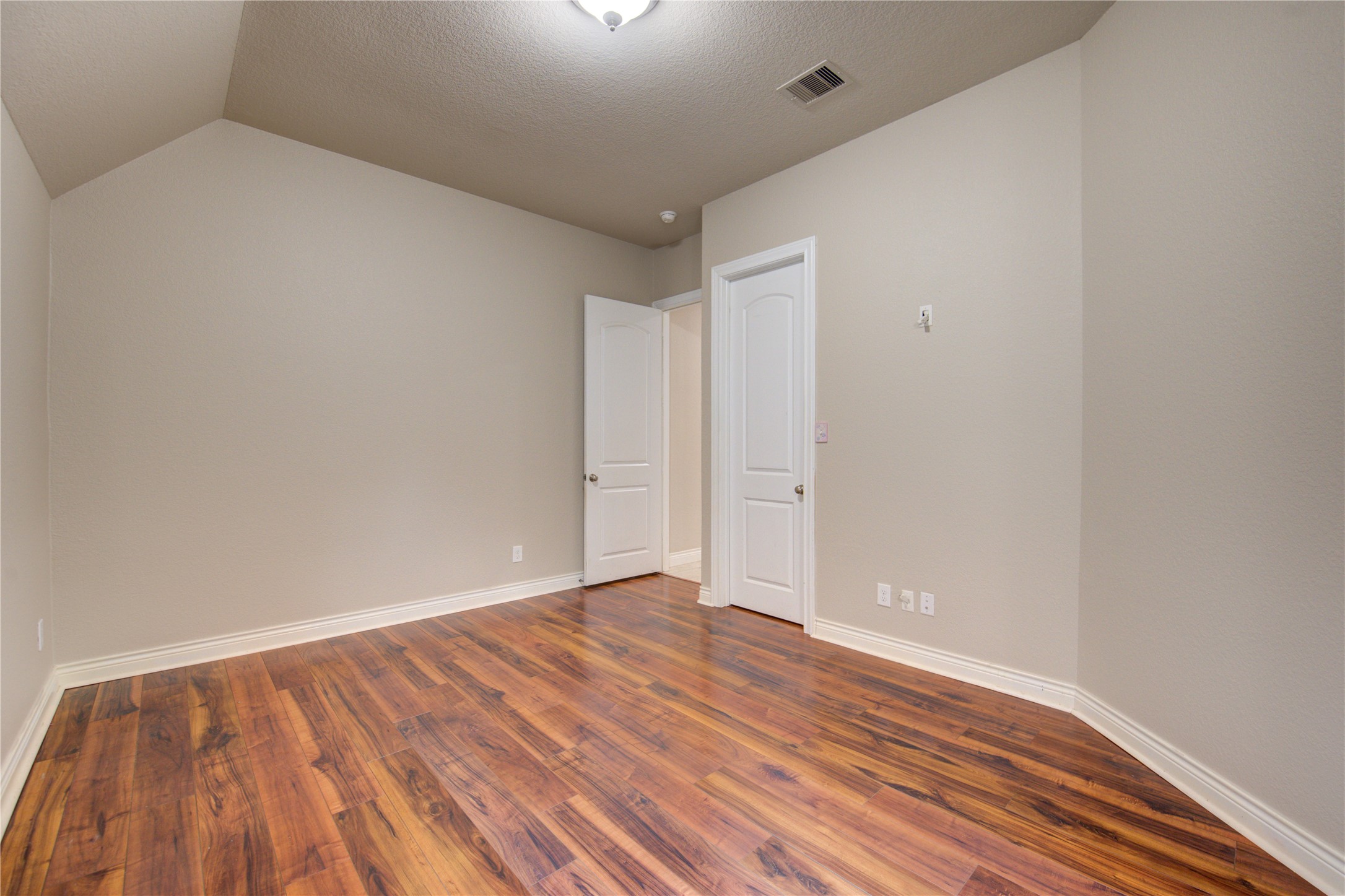 29103 Erica Lee Court Katy, TX 77494 - Photo 40 of 49 a view of an empty room with wooden floor