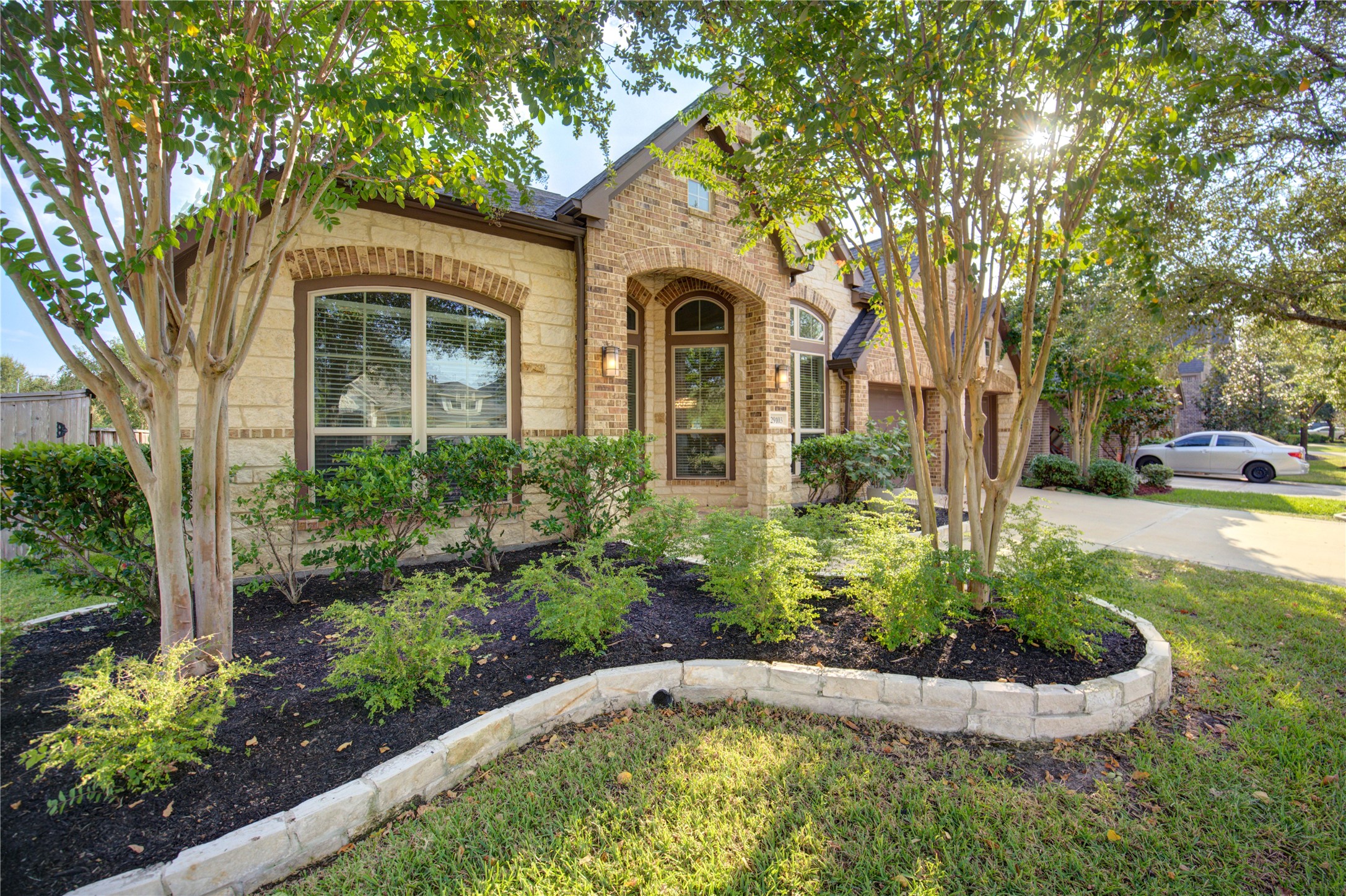 29103 Erica Lee Court Katy, TX 77494 - Photo 5 of 49 a front view of a house with a yard