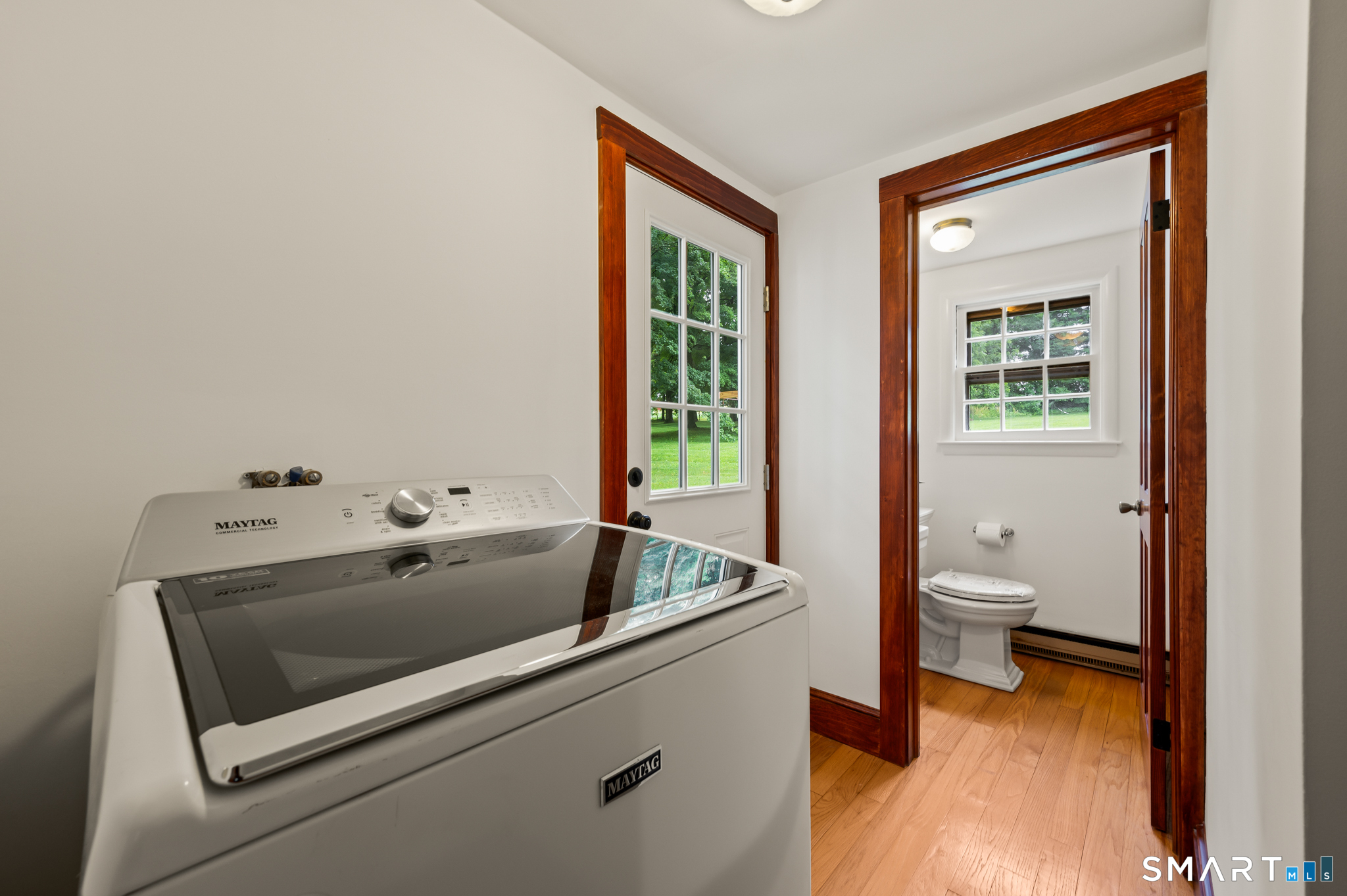 128 Norwich-Lebanon Road Franklin, CT 06254 - Photo 21 of 39 Laundry area and half-bath near back door