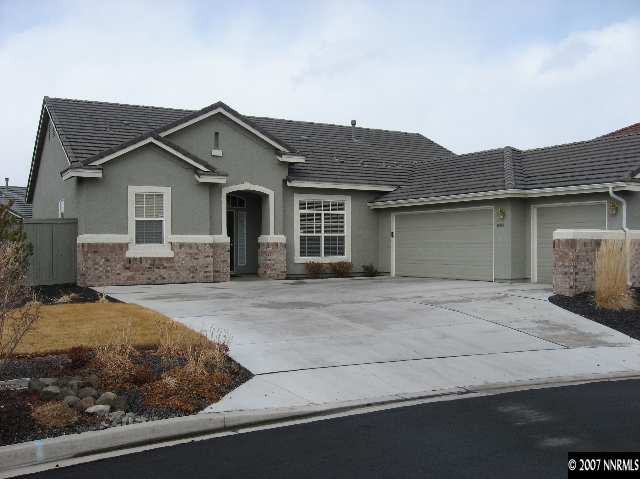 10661 Copper Moon Court Reno, NV 89521 - Photo 1 of 9 a front view of a house with a garden
