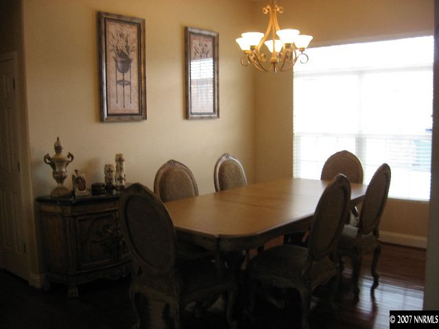 10661 Copper Moon Court Reno, NV 89521 - Photo 4 of 9 a view of a dining room with furniture and chandelier