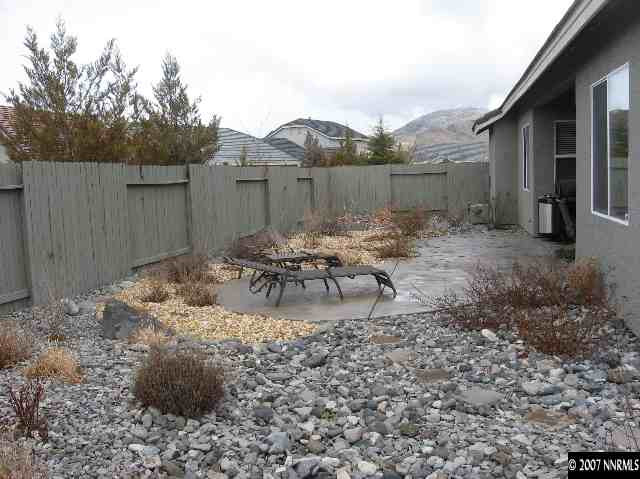 10661 Copper Moon Court Reno, NV 89521 - Photo 8 of 9 a view of a backyard with sitting area