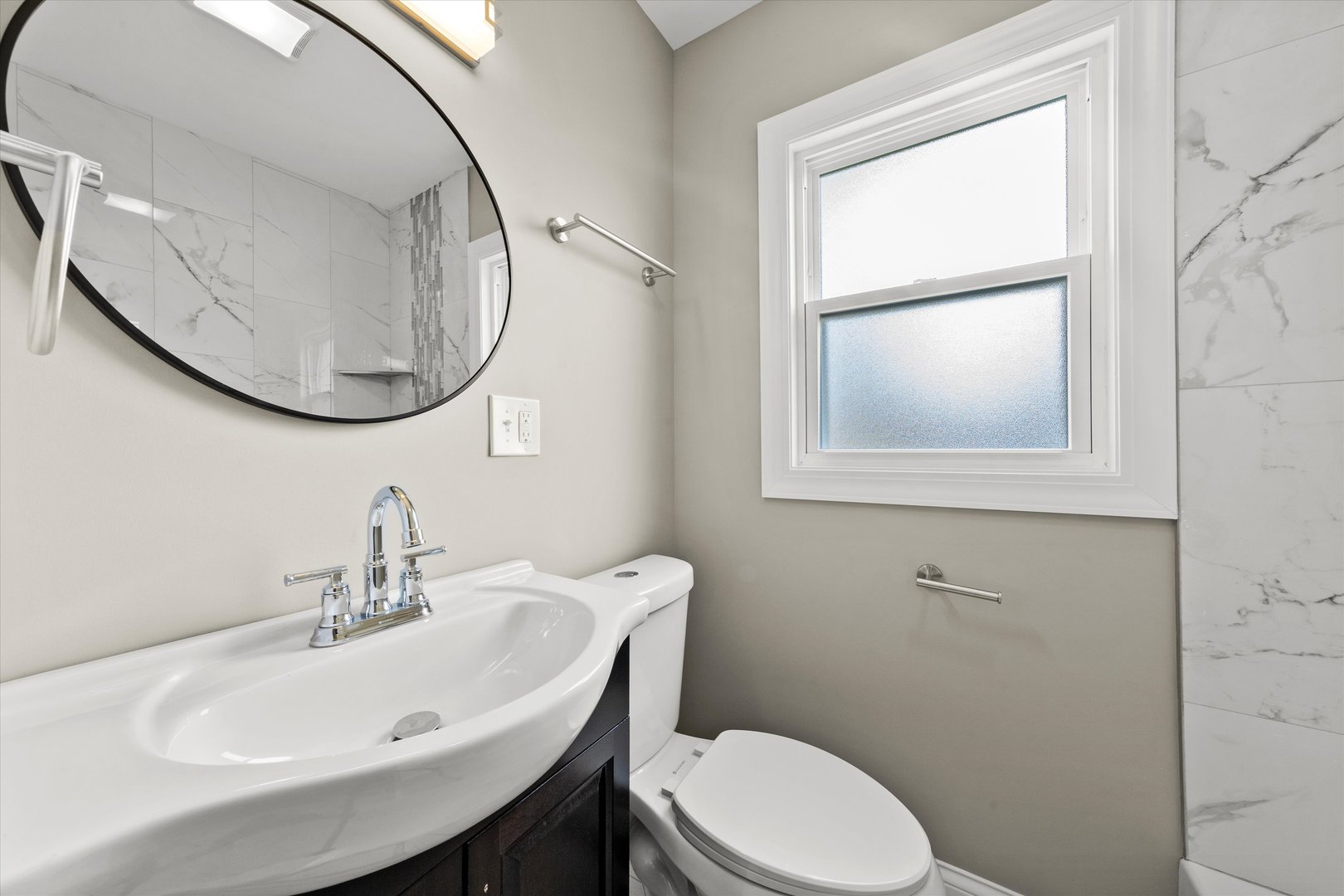 12223 South Ada Street Chicago, IL 60643 - Photo 11 of 22 a bathroom with a sink a mirror and a toilet