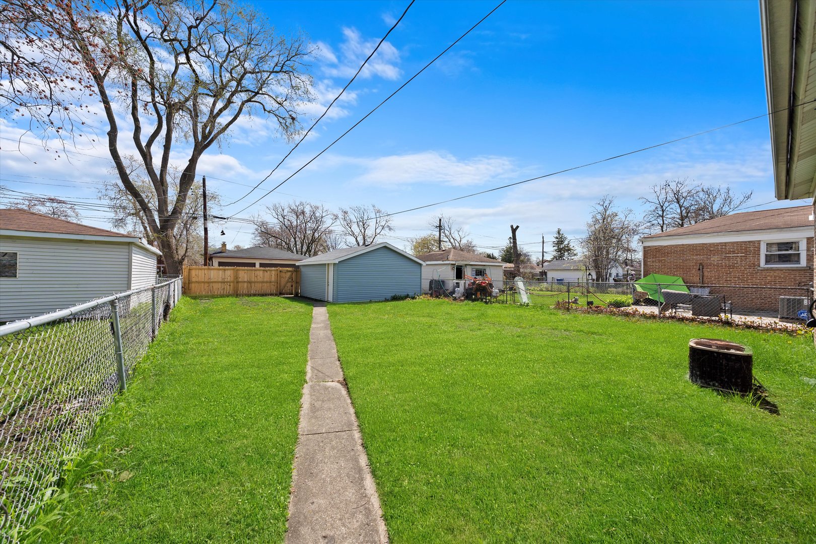12223 South Ada Street Chicago, IL 60643 - Photo 18 of 22 a view of a garden with a slide