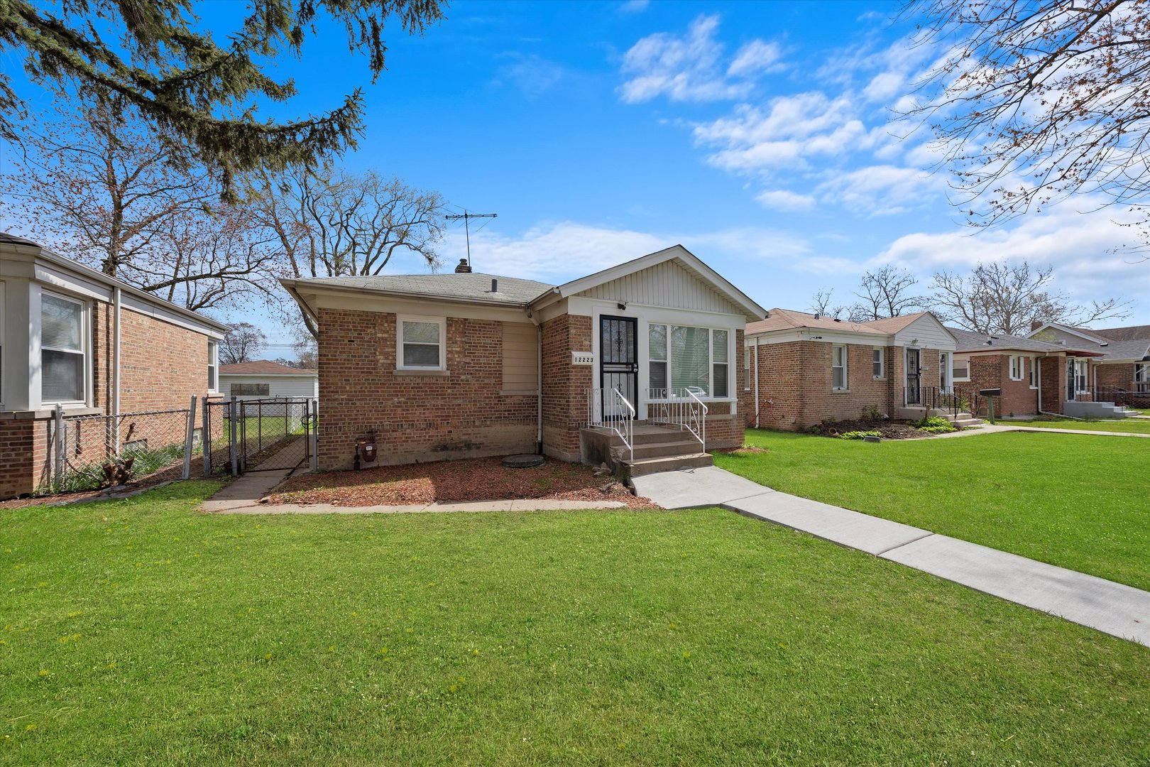 12223 South Ada Street Chicago, IL 60643 - Photo 20 of 22 a view of a house with a yard porch and sitting area