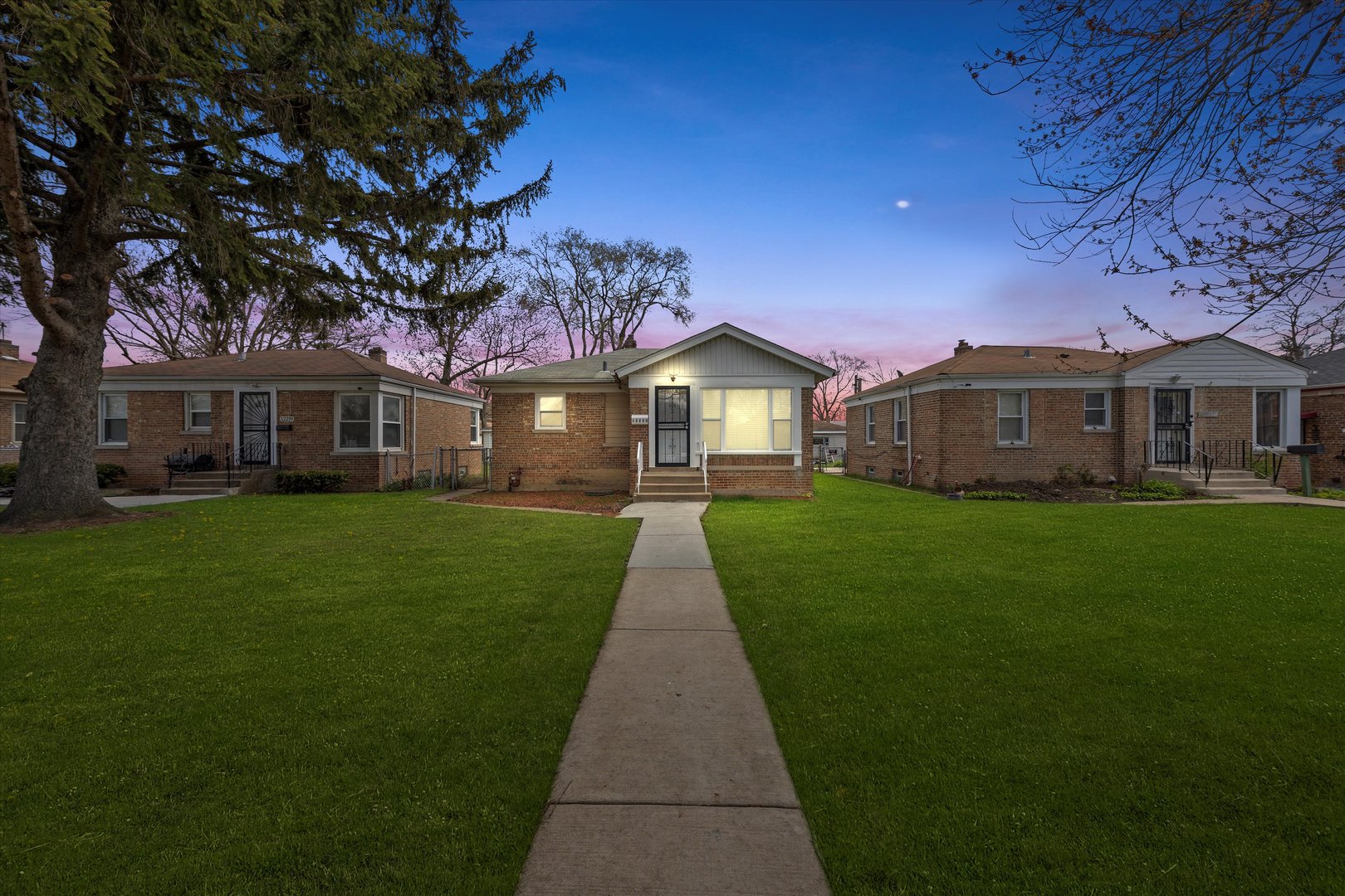 12223 South Ada Street Chicago, IL 60643 - Photo 21 of 22 front view of a house with a garden