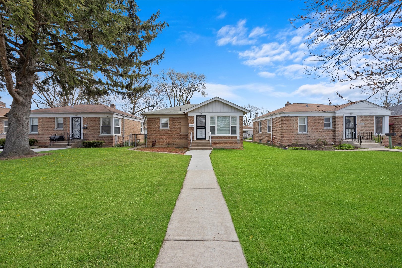 12223 South Ada Street Chicago, IL 60643 - Photo 22 of 22 a view of a big house with a big yard and large trees