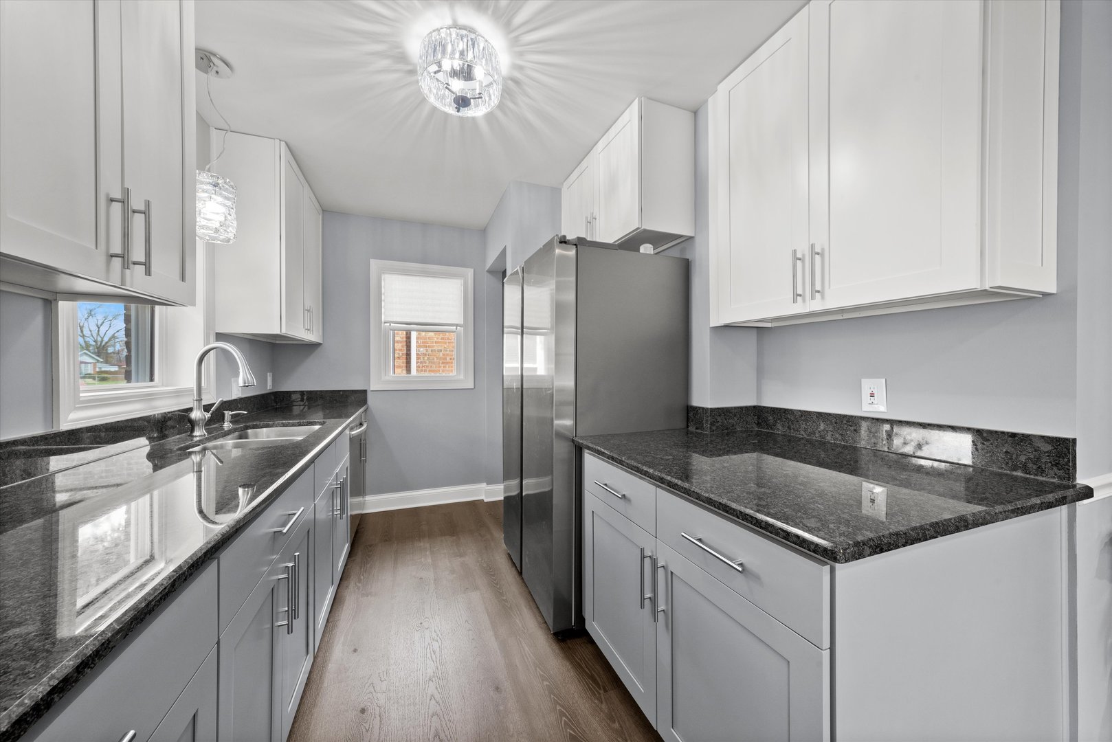 12223 South Ada Street Chicago, IL 60643 - Photo 7 of 22 a kitchen with granite countertop a sink stove and refrigerator
