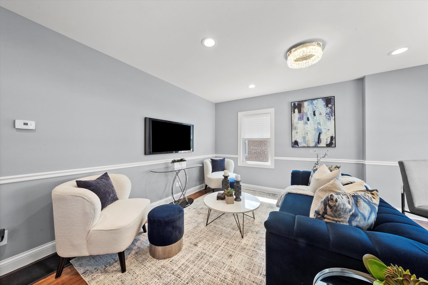 12223 South Ada Street Chicago, IL 60643 - Photo 9 of 22 a living room with furniture and a flat screen tv