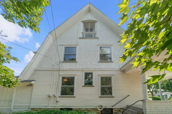 a front view of a house with balcony