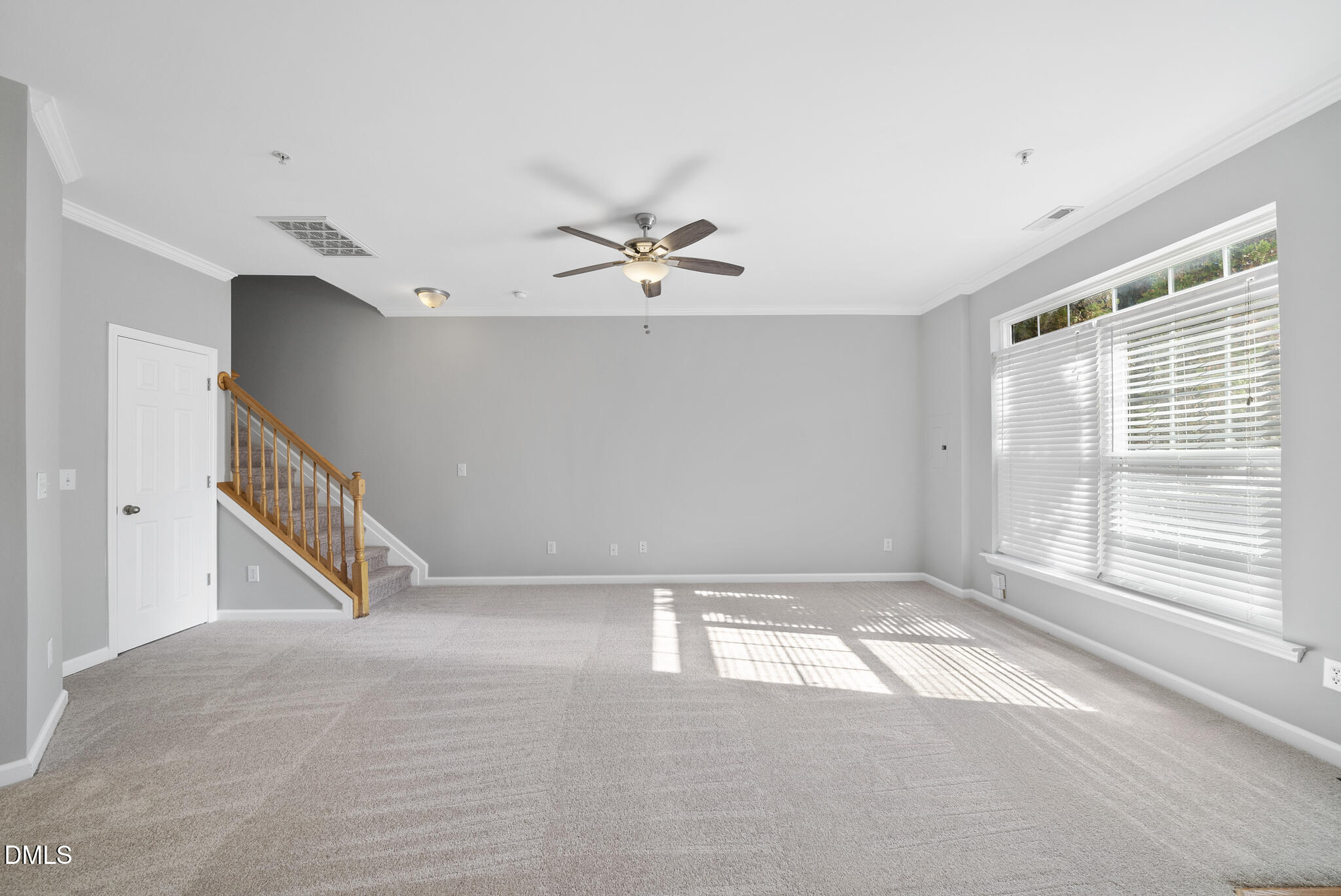 2211 Raven Road, Unit 102 Raleigh, NC 27614 - Photo 7 of 30 a view of an empty room with a window