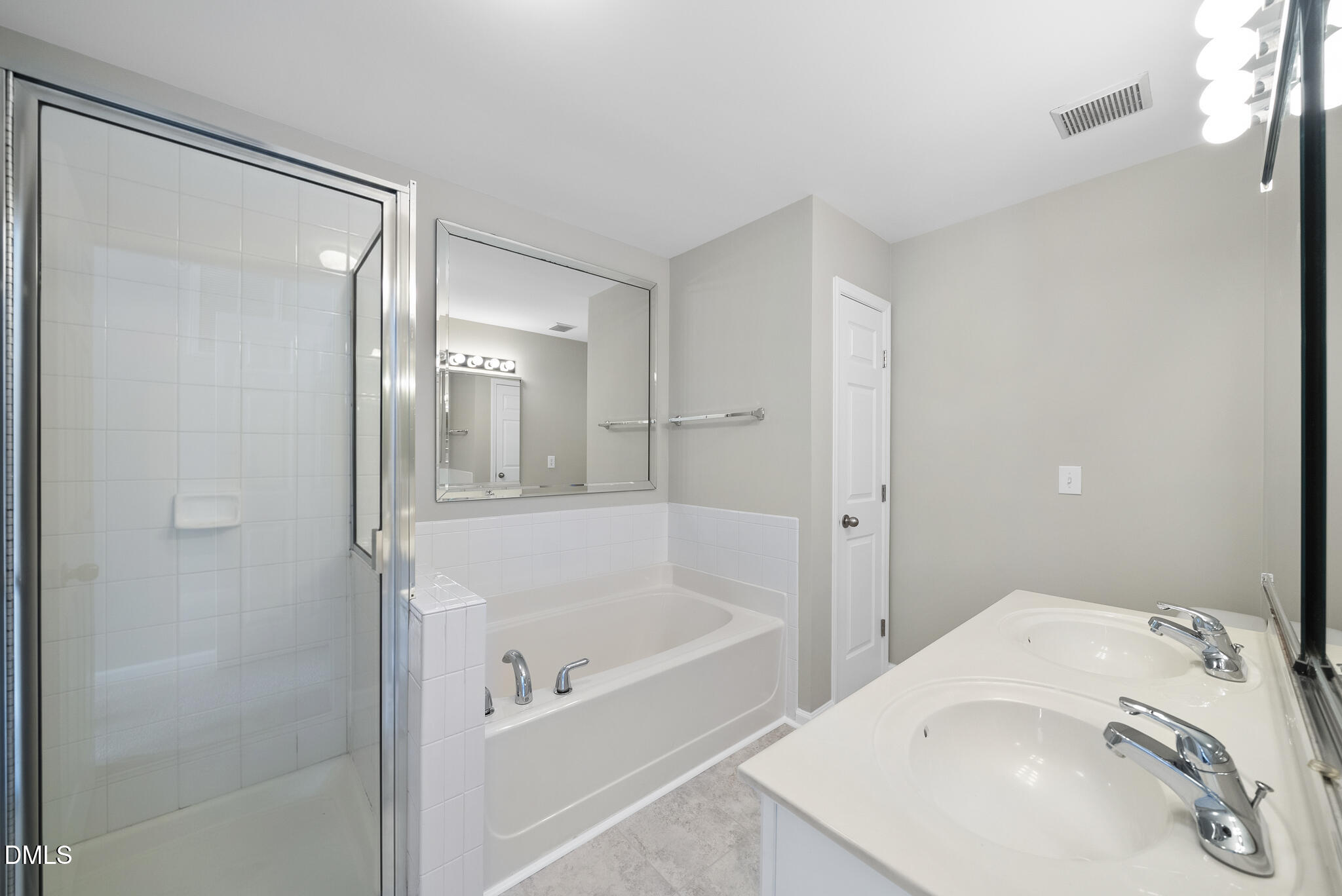 2211 Raven Road, Unit 102 Raleigh, NC 27614 - Photo 19 of 30 a white bath tub sitting next to a white sink