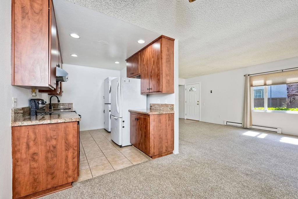 8741 Wahl Street Santee, CA 92071 - Photo 12 of 30 a view of a kitchen with electric appliances