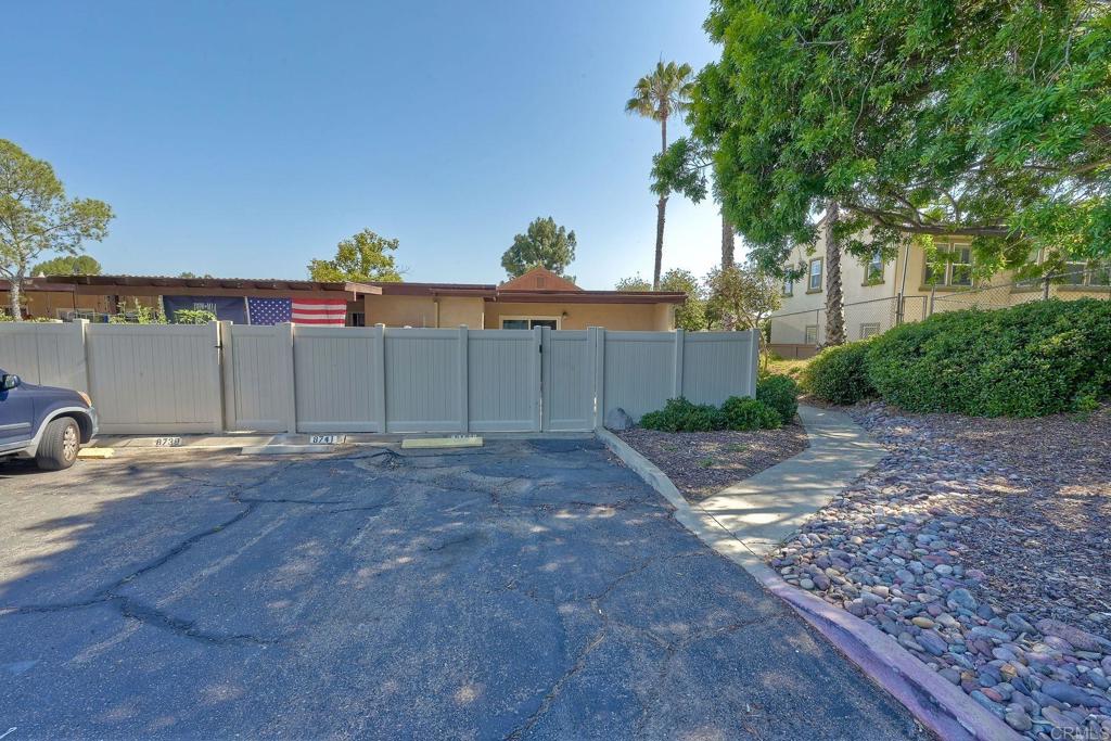 8741 Wahl Street Santee, CA 92071 - Photo 27 of 30 a backyard of a house with plants and trees