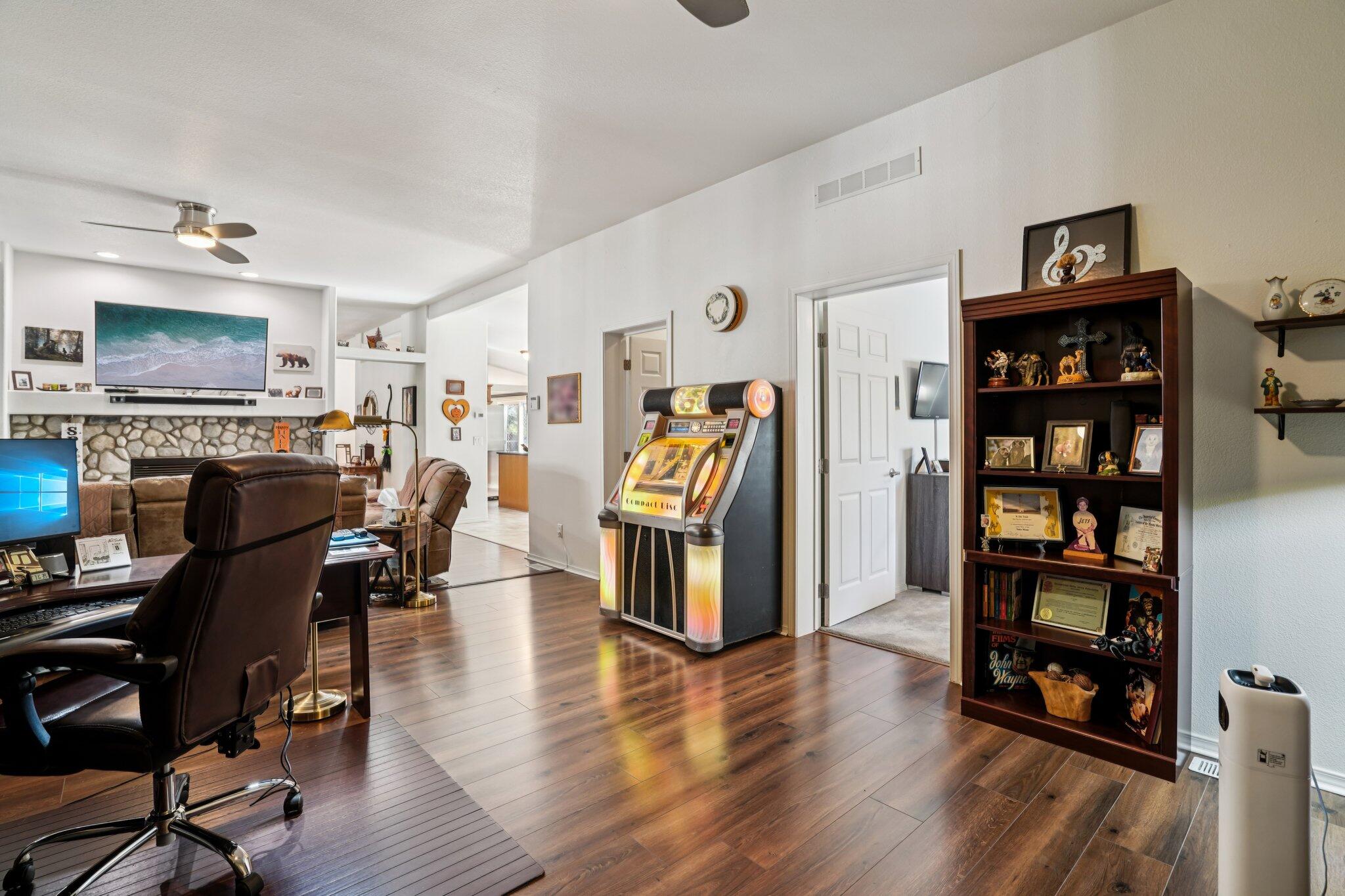 25001 Rim Rock Road Idyllwild, CA 92549 - Photo 24 of 49 a view of a livingroom with furniture and bookshelf
