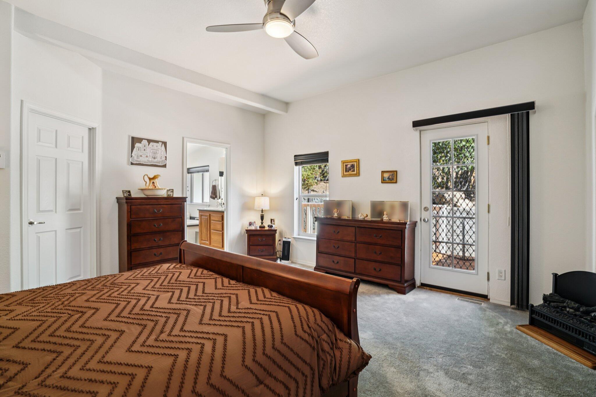 25001 Rim Rock Road Idyllwild, CA 92549 - Photo 25 of 49 a bed room with a bed and a television