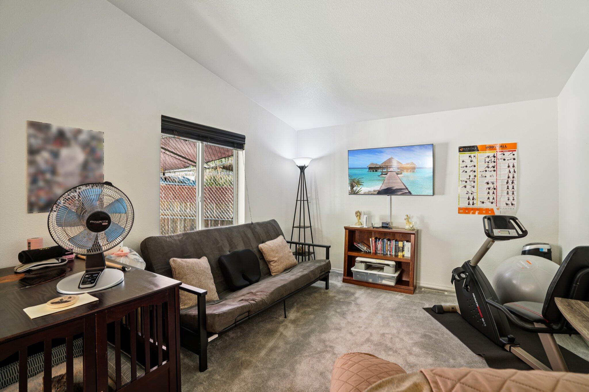 25001 Rim Rock Road Idyllwild, CA 92549 - Photo 29 of 49 a living room with furniture and a window