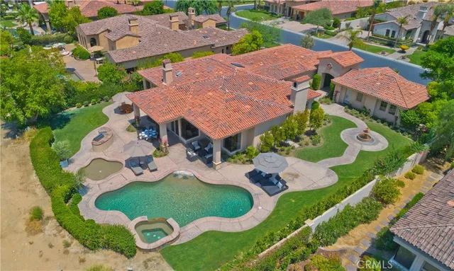 an aerial view of a house with garden