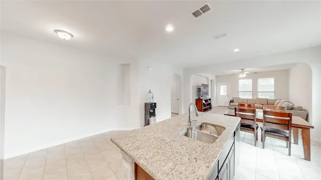 a living room with furniture and a table