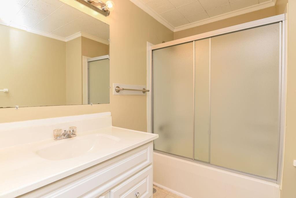 110 Gill Drive Beaver Falls, PA 15010 - Photo 13 of 25 a bathroom with a shower and a sink