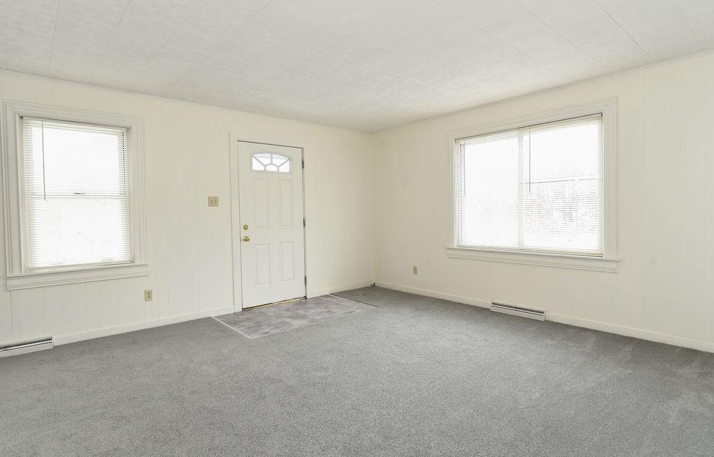 110 Gill Drive Beaver Falls, PA 15010 - Photo 16 of 25 an empty room with windows