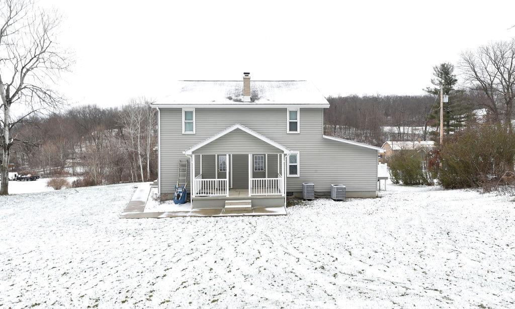 110 Gill Drive Beaver Falls, PA 15010 - Photo 2 of 25 a front view of a house with a yard
