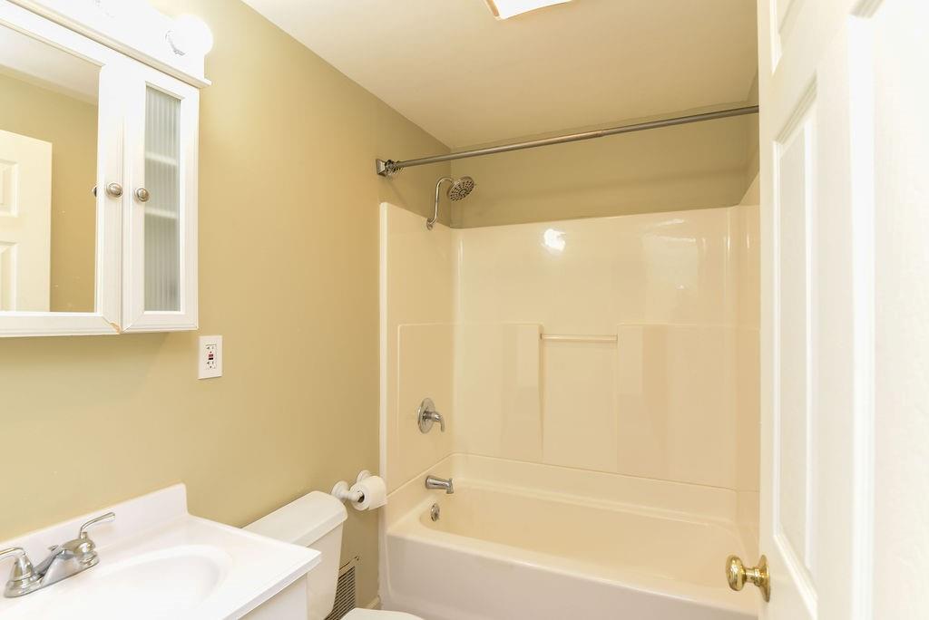 110 Gill Drive Beaver Falls, PA 15010 - Photo 21 of 25 a bathroom with a bathtub and a shower