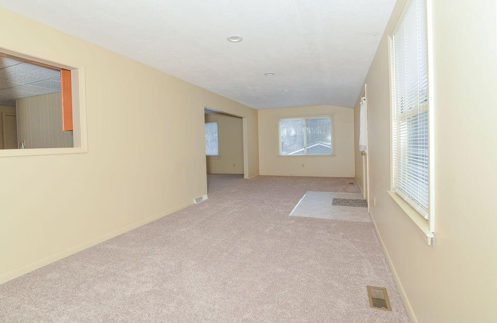 110 Gill Drive Beaver Falls, PA 15010 - Photo 5 of 25 an empty room with windows