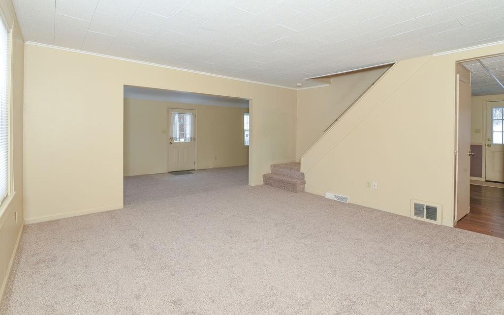 110 Gill Drive Beaver Falls, PA 15010 - Photo 7 of 25 a view of a big room with closet and windows