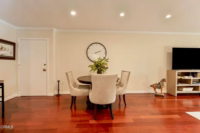 a view of a livingroom with furniture and wooden floor