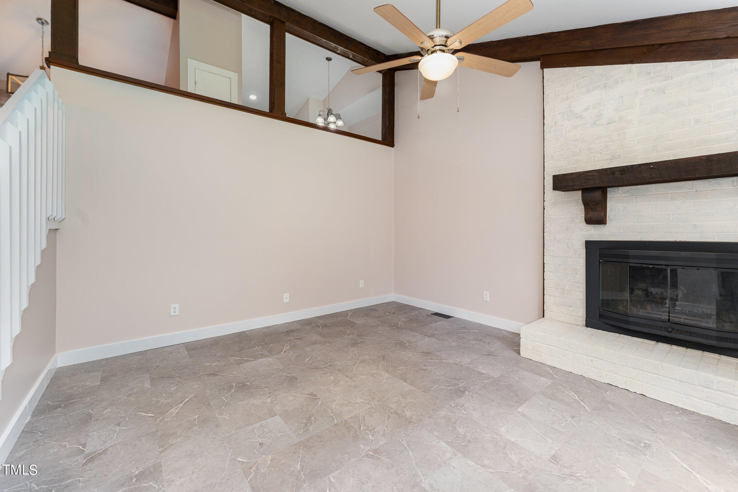 804 Buckingham Road Garner, NC 27529 - Photo 4 of 36 Great room with fireplace and vaulted ceilings