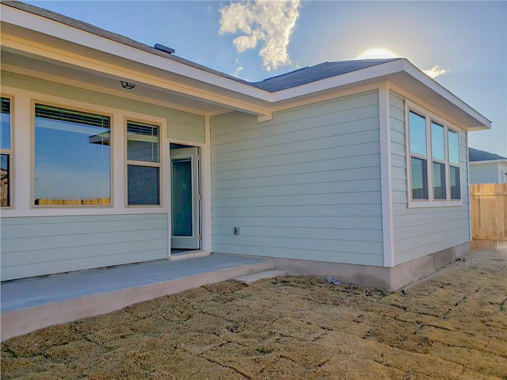 221 El Dorado Road Jarrell, TX 76537 - Photo 14 of 17 View of exterior entry featuring a patio