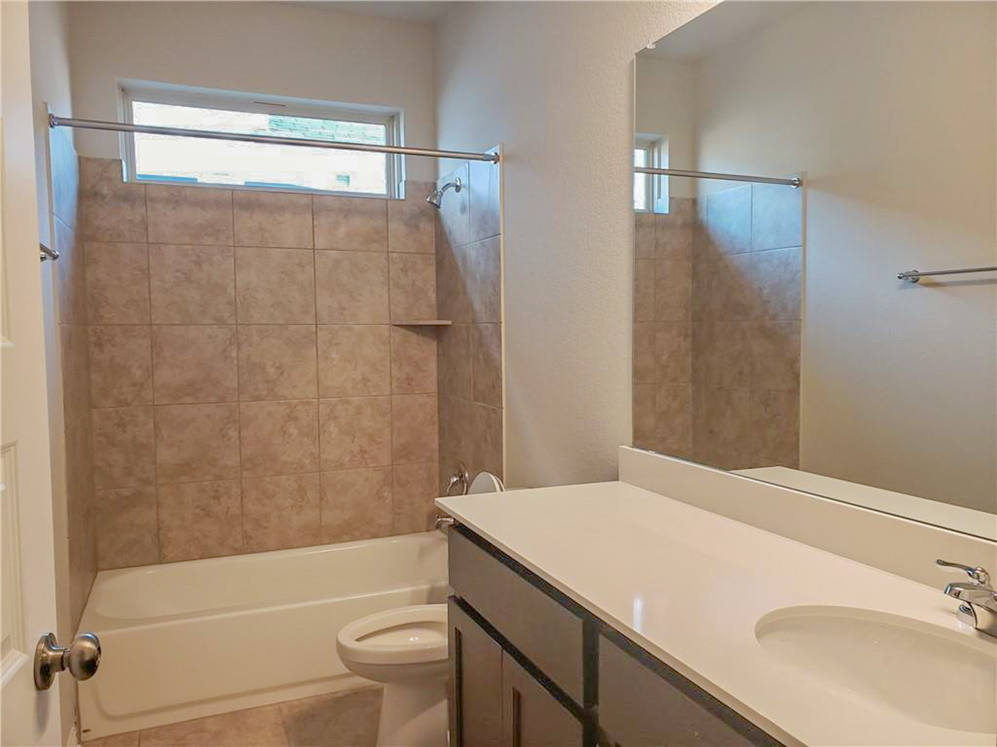 221 El Dorado Road Jarrell, TX 76537 - Photo 6 of 17 Full bath with shower combination, vanity, and light tile patterned flooring